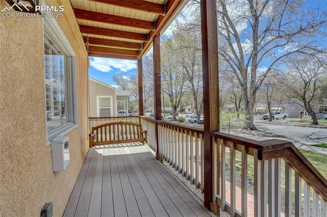 a view of a deck with wooden fence and floor