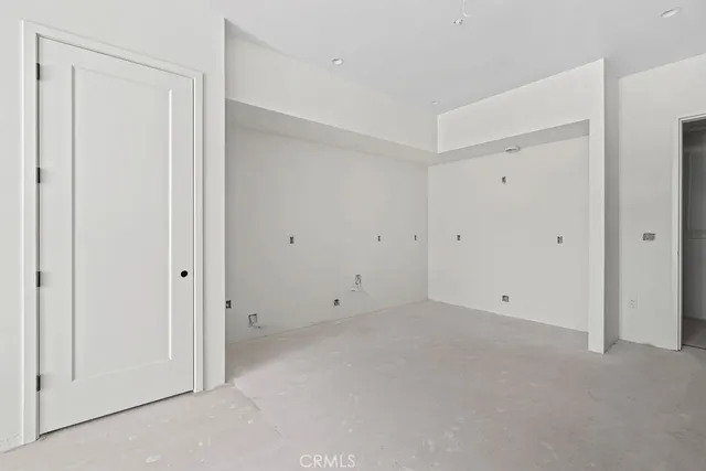 a view of a room with a large window