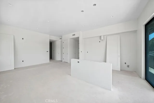 a view of balcony with two chairs and a table