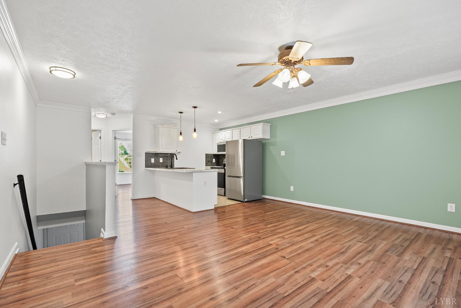 300 McConville Road, Unit 63 Lynchburg, VA 24502 - Photo 17 of 37 a view of a kitchen with wooden floor and a kitchen