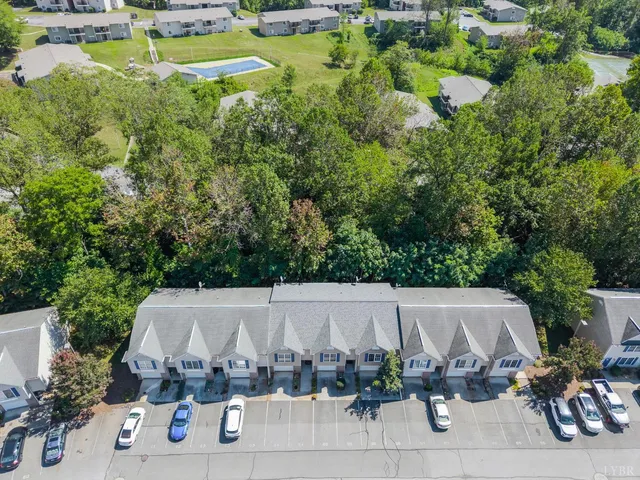 an aerial view of a house with a garden