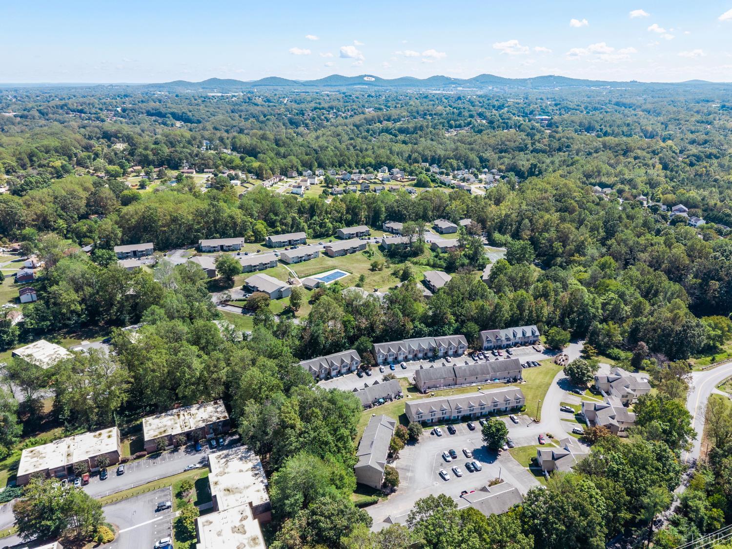 300 McConville Road, Unit 63 Lynchburg, VA 24502 - Photo 32 of 37 an aerial view of a house with a garden