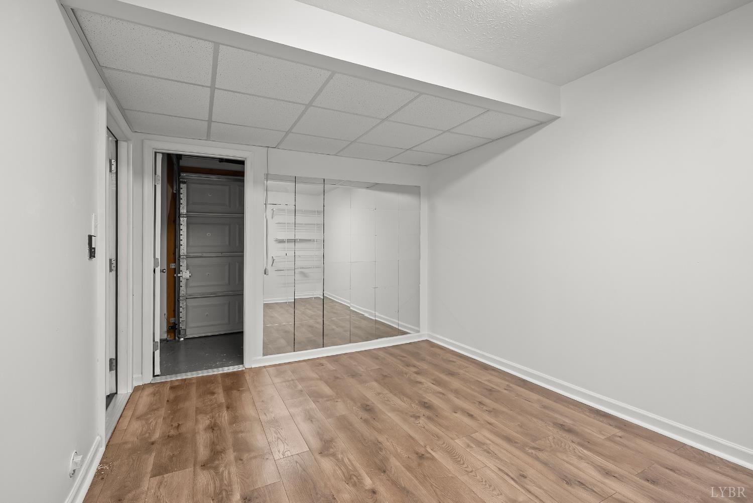 300 McConville Road, Unit 63 Lynchburg, VA 24502 - Photo 10 of 37 wooden floor in an empty room