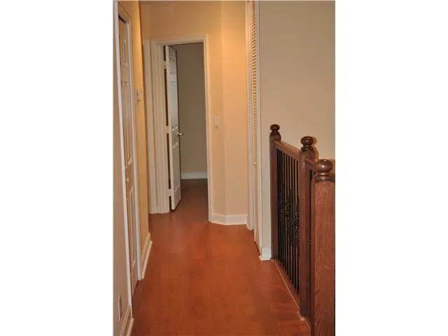 a view of a room with a hallway