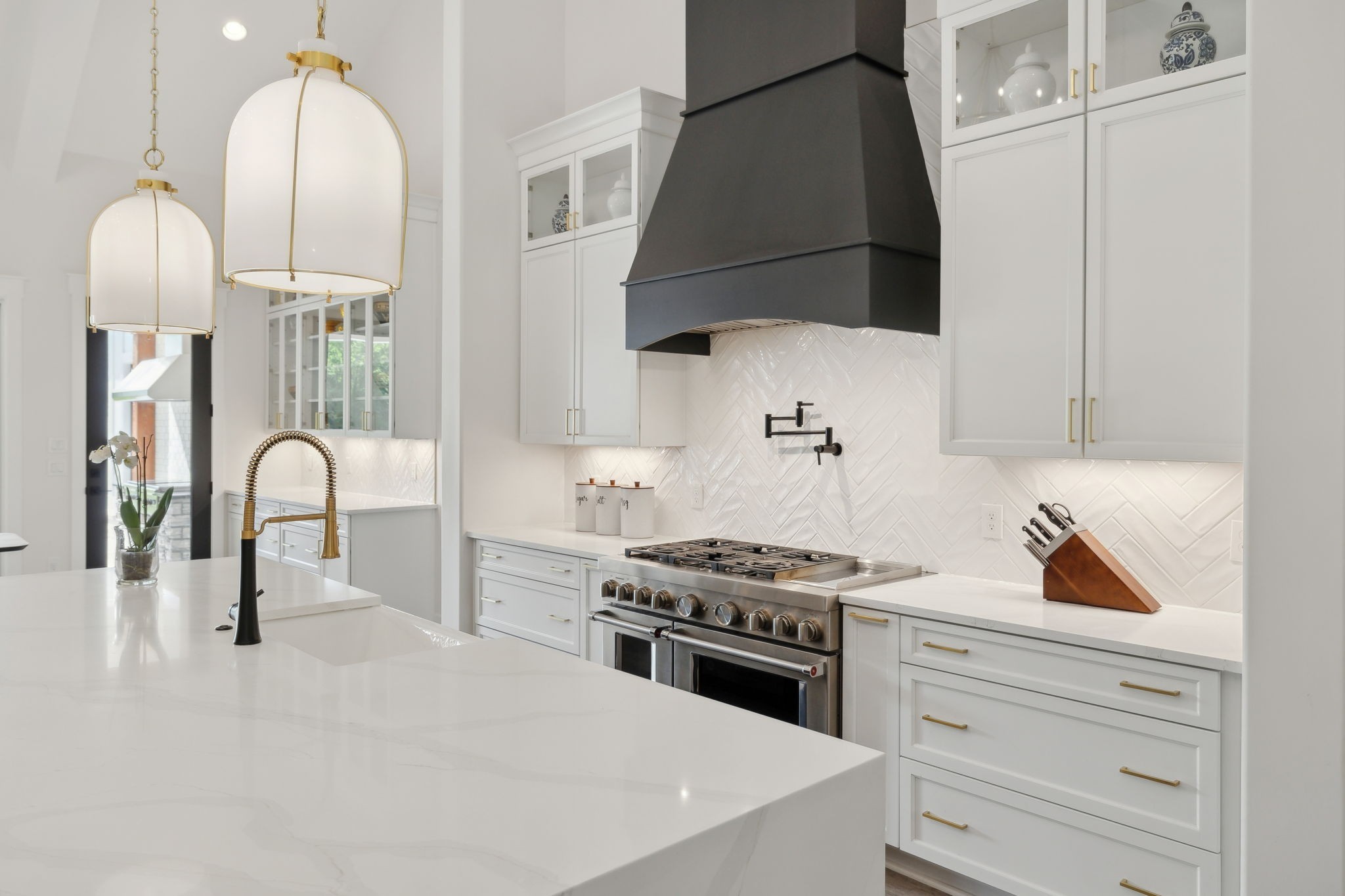 2648 Wilson Overall Road Murfreesboro, TN 37127 - Photo 44 of 92 a kitchen with stainless steel appliances a stove a sink and a white cabinets