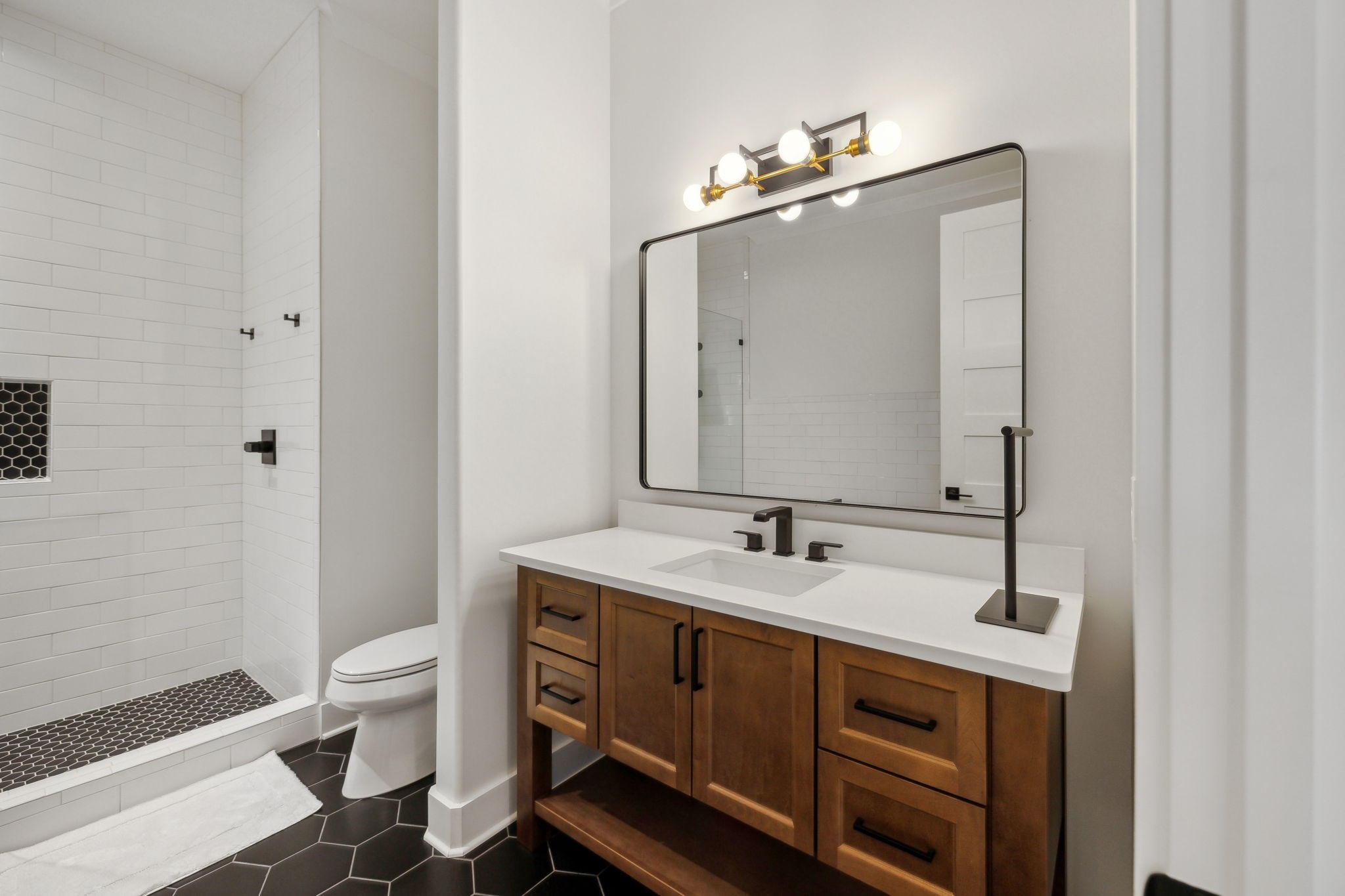 2648 Wilson Overall Road Murfreesboro, TN 37127 - Photo 72 of 92 a spacious bathroom with a double vanity sink toilet and mirror
