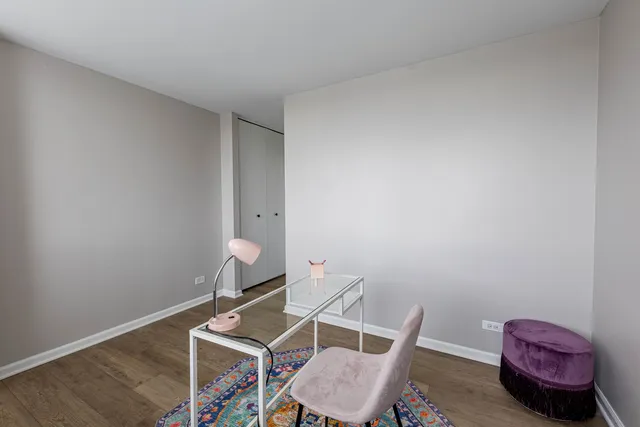 a room with furniture and a wooden floor