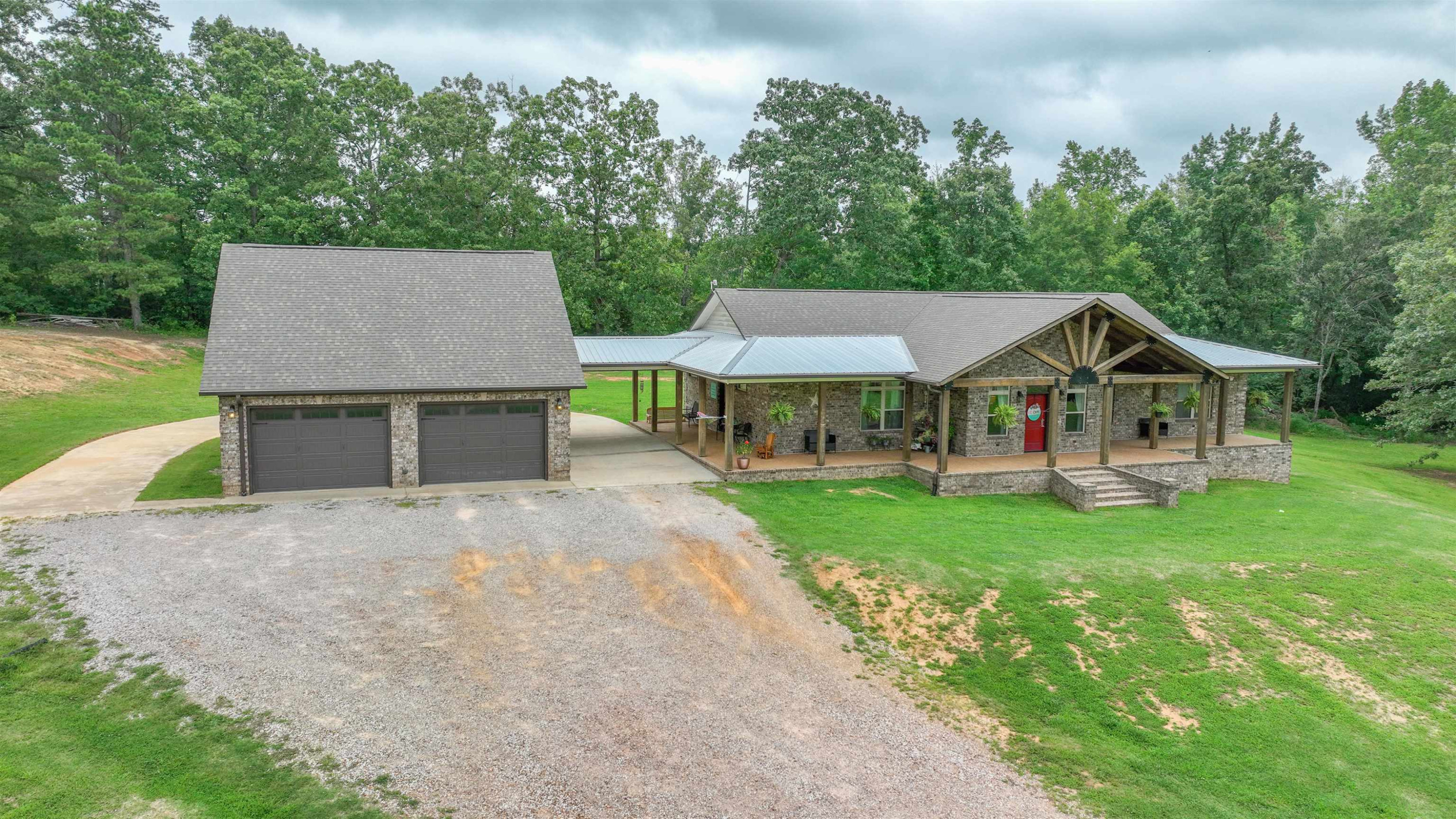 4405 Old Friendship Road Finger, TN 38334 - Photo 1 of 38 a view of a house with a yard and sitting area