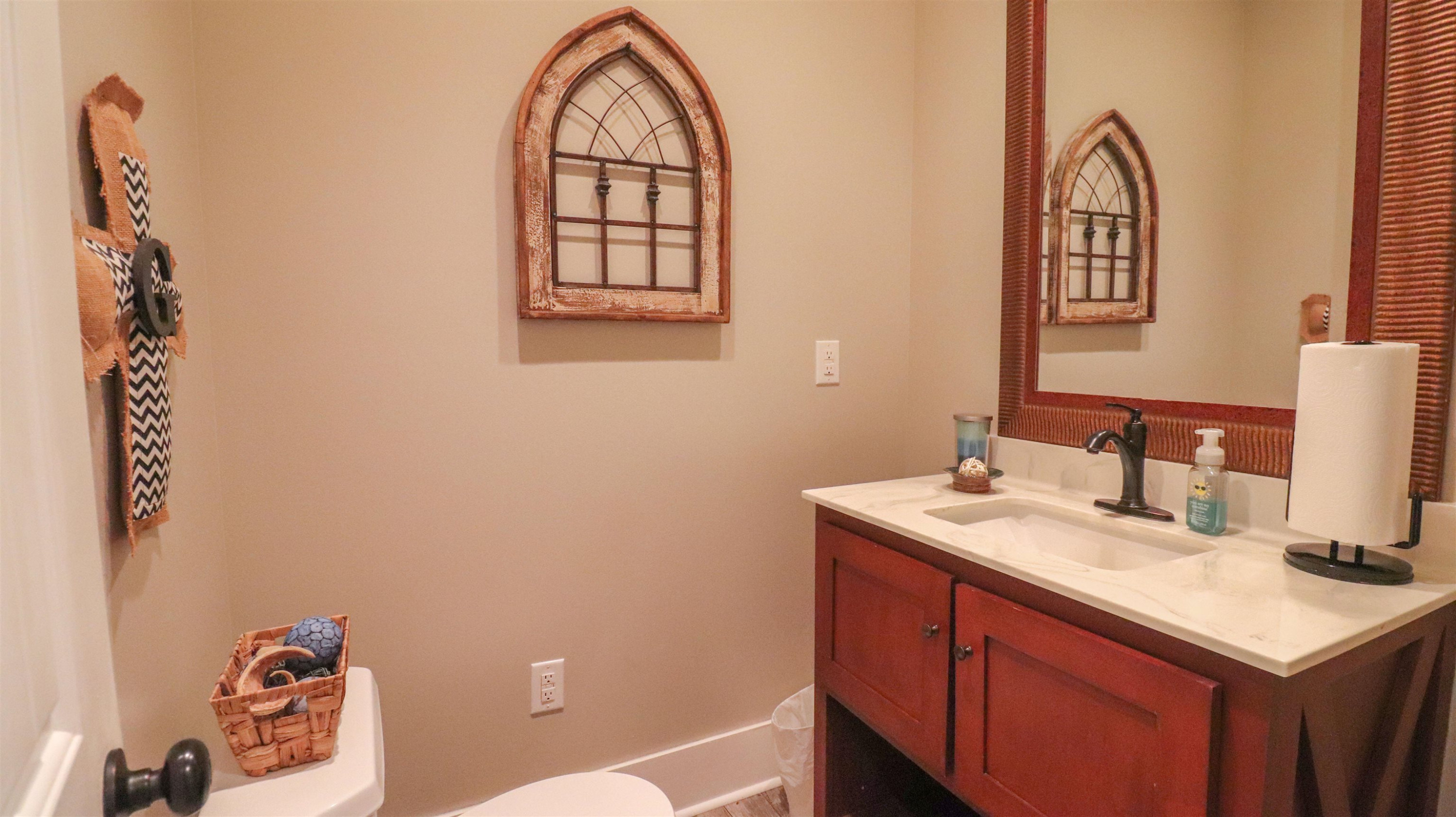 4405 Old Friendship Road Finger, TN 38334 - Photo 24 of 38 a bathroom with a sink and a mirror