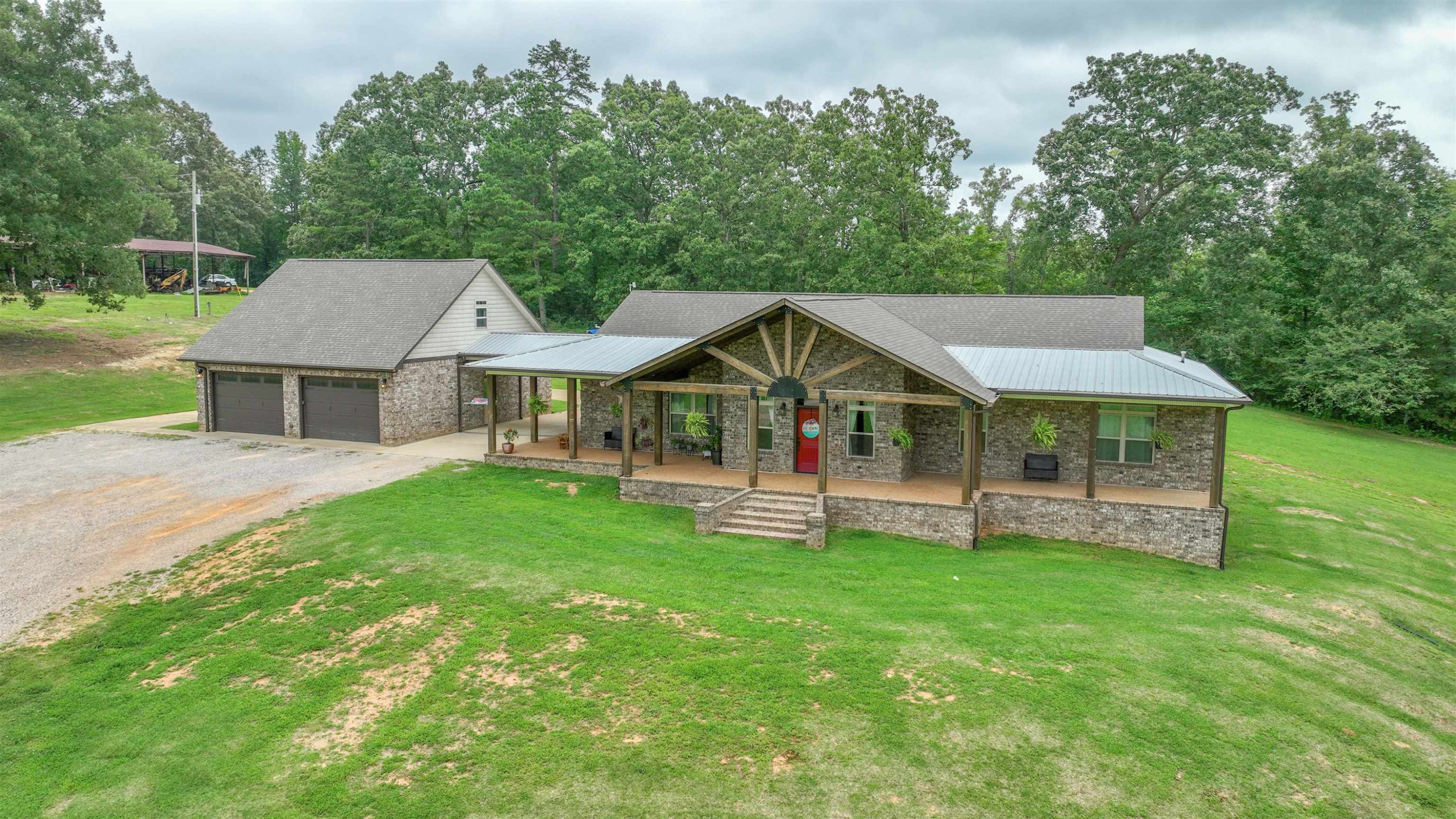 4405 Old Friendship Road Finger, TN 38334 - Photo 6 of 38 a view of a house with a yard and sitting area