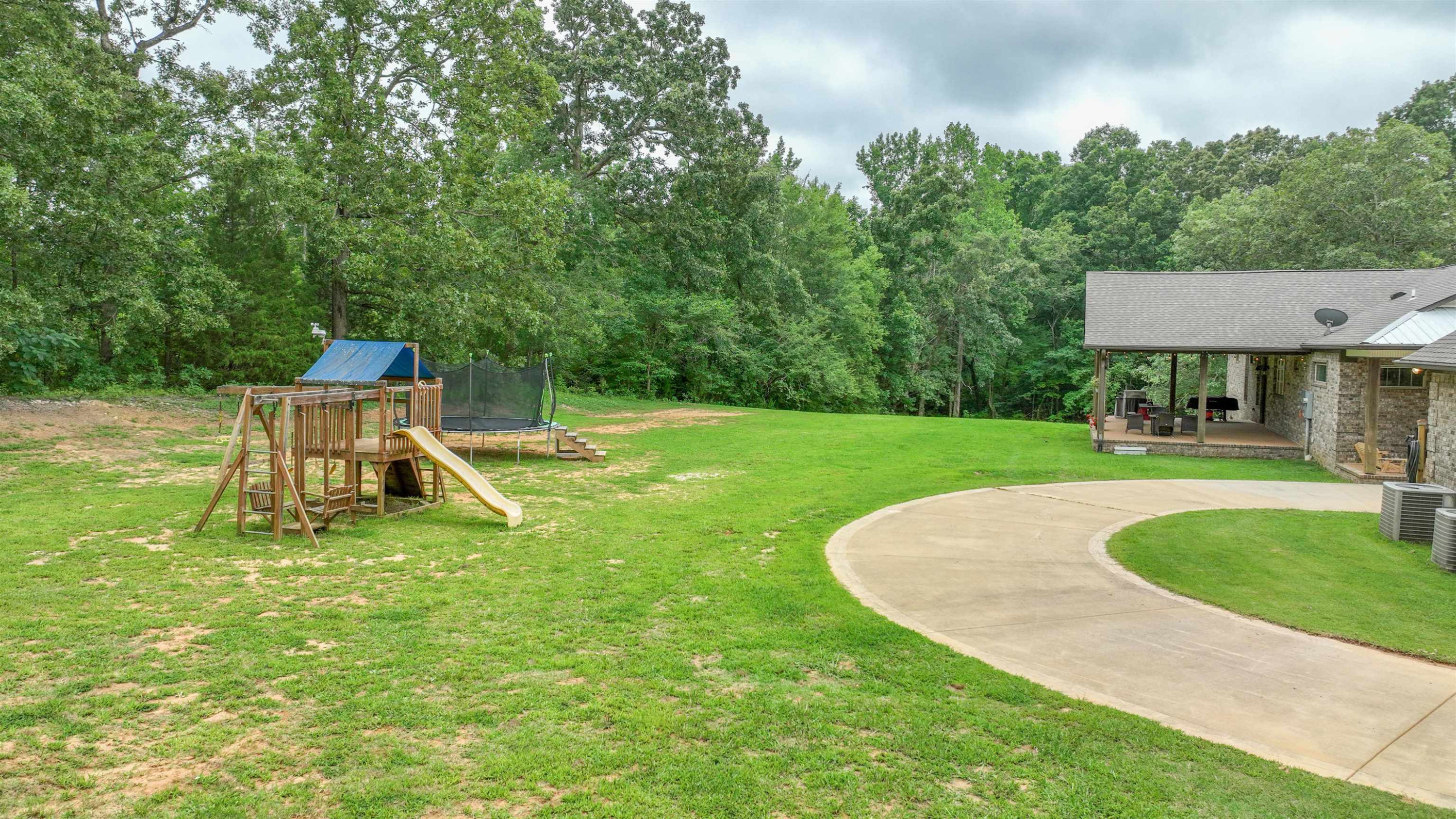 4405 Old Friendship Road Finger, TN 38334 - Photo 8 of 38 a view of a house with a yard