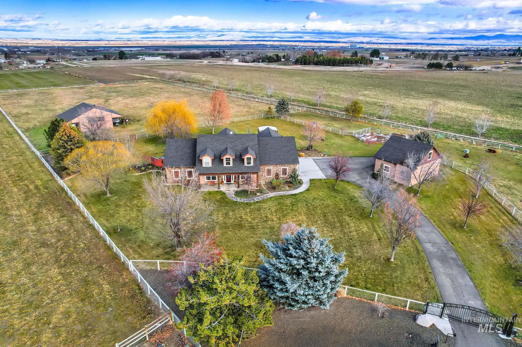 19288 Majestic View Place Caldwell, ID 83607 - Photo 4 of 50 Aerial view of property and surrounding area with rural landscape