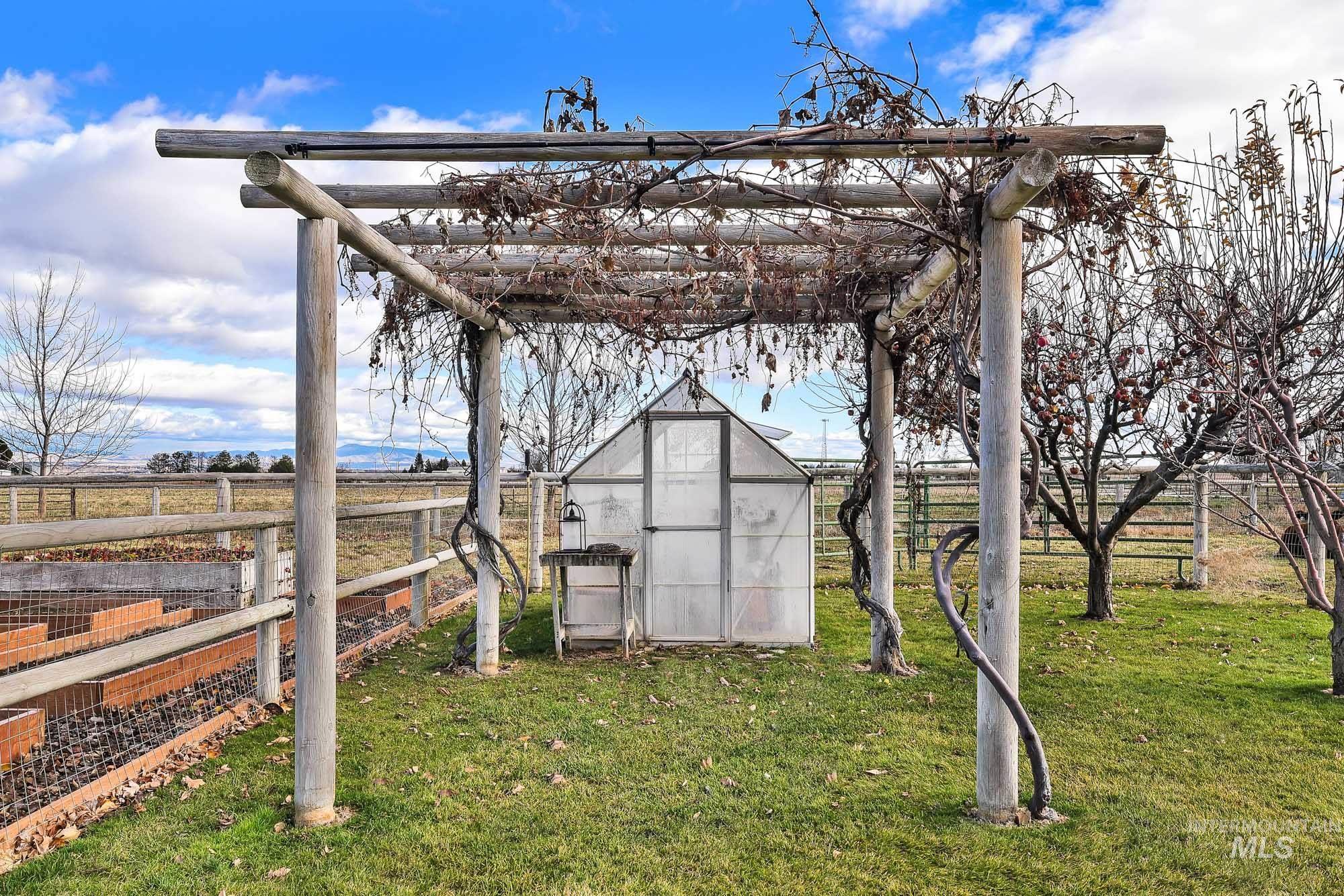 19288 Majestic View Place Caldwell, ID 83607 - Photo 43 of 50 View of grape arbor featuring an exterior greenhouse