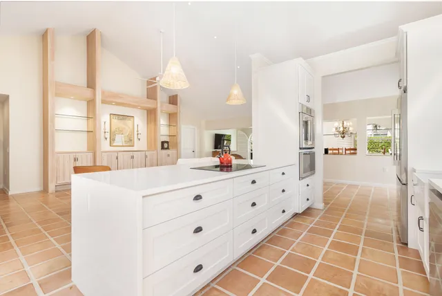 a bed room with a bed and a television