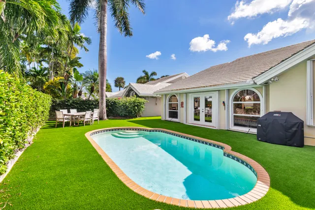 a view of a table and chairs in patio