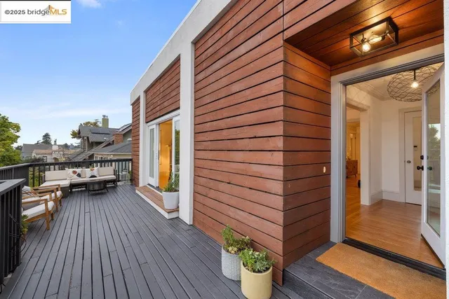 a living room with furniture a rug and a fireplace