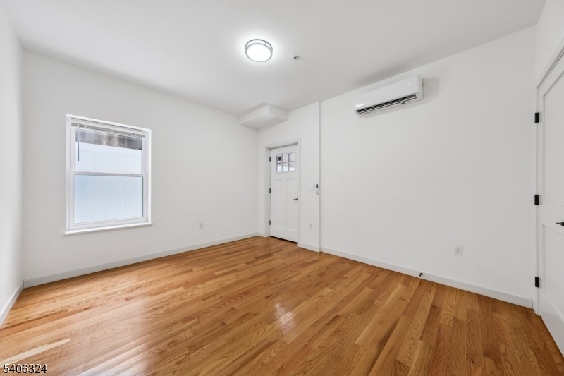 52 James Street, Unit 1 Newark, NJ 07102 - Photo 14 of 28 a view of empty room with wooden floor