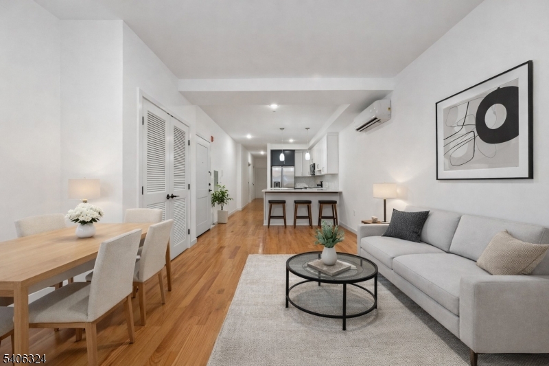52 James Street, Unit 1 Newark, NJ 07102 - Photo 3 of 28 a living room with furniture