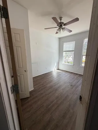 a view of entryway with wooden floor