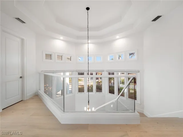 a view of a living room and entryway