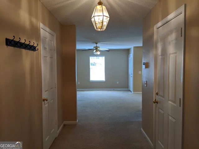 a view of entryway with wooden floor