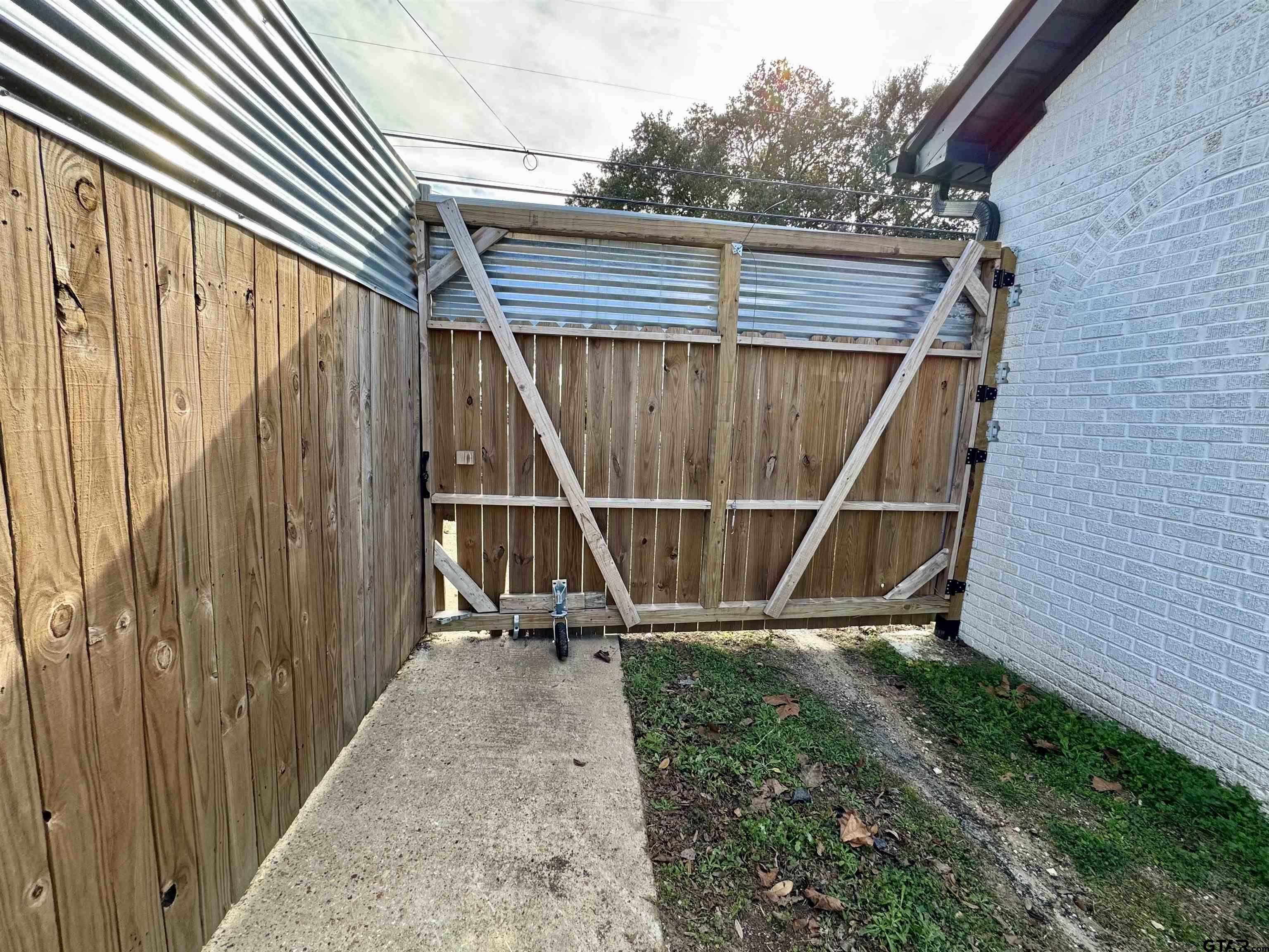 403 East Henderson Street Overton, TX 75684 - Photo 24 of 31 a view of outdoor space with wooden deck and outdoor space