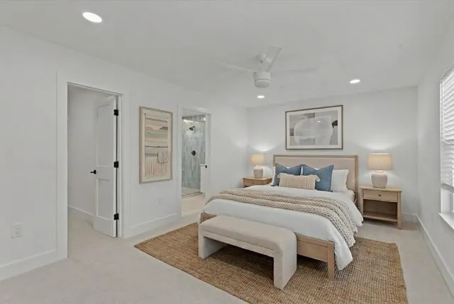 a bedroom with a bed and a walk in closet