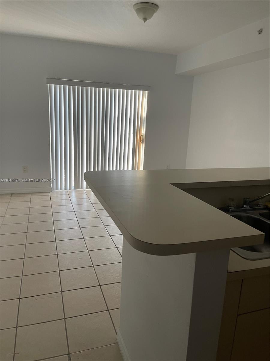 11060 Southwest 196th Street, Unit 601 Cutler Bay, FL 33157 - Photo 2 of 9 a view of an empty room