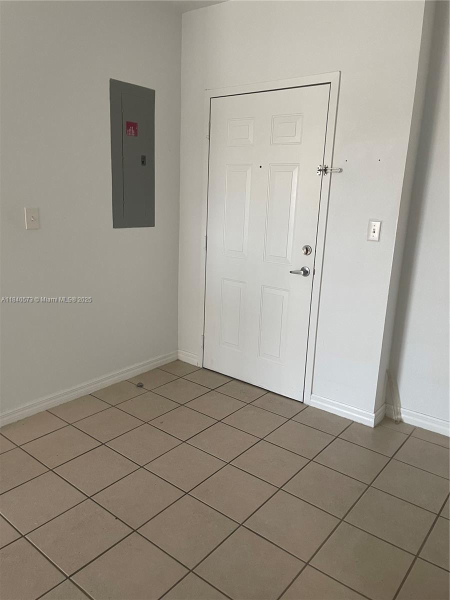 11060 Southwest 196th Street, Unit 601 Cutler Bay, FL 33157 - Photo 5 of 9 a view of an empty room