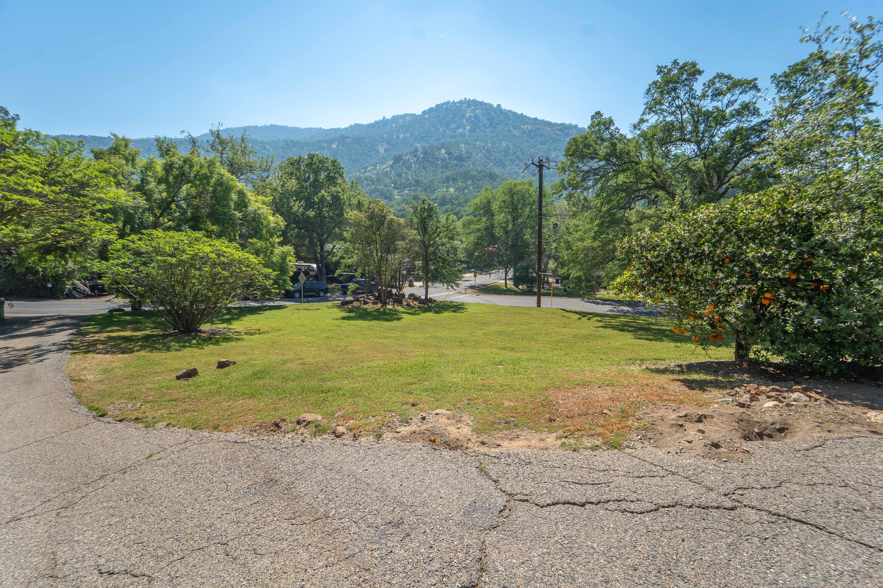 40962 Oak Ridge Drive Three Rivers, CA 93271 - Photo 35 of 36 a view of a swimming pool with a yard