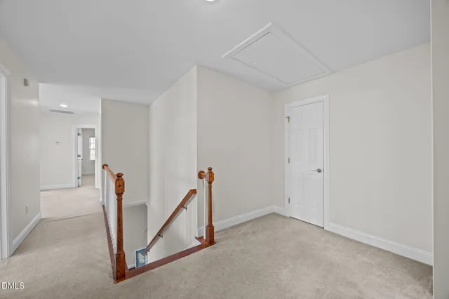 a bathroom with a toilet a sink and a mirror