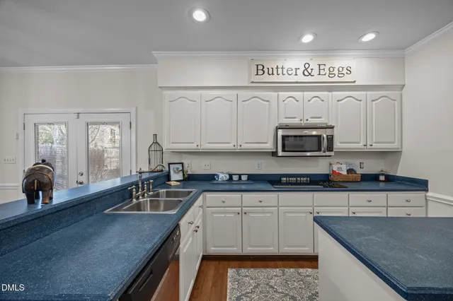 a kitchen with a stove and a microwave