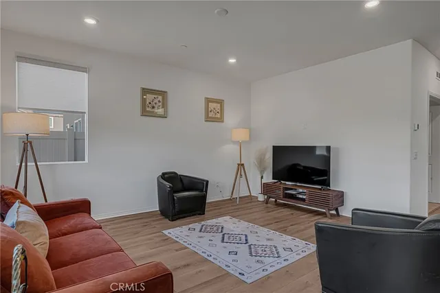 a kitchen with a table and chairs in it