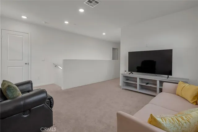 a view of a workspace with furniture