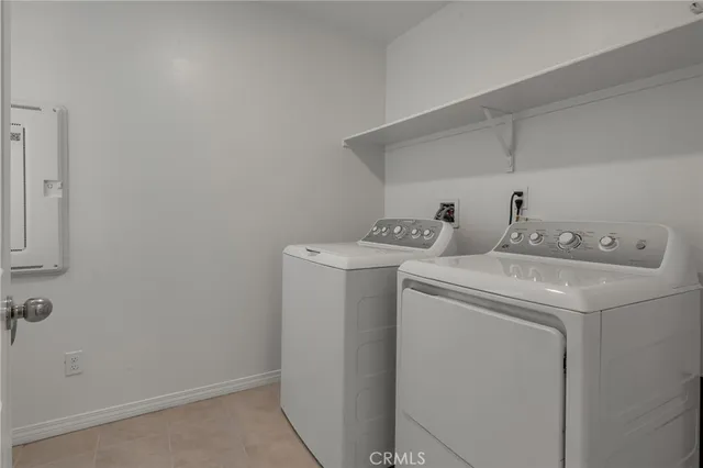 an aerial view of residential houses and outdoor space