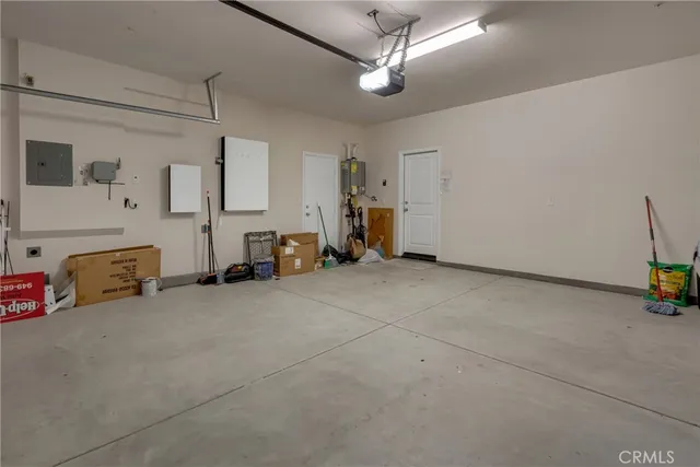 an aerial view of a house with yard swimming pool and outdoor seating