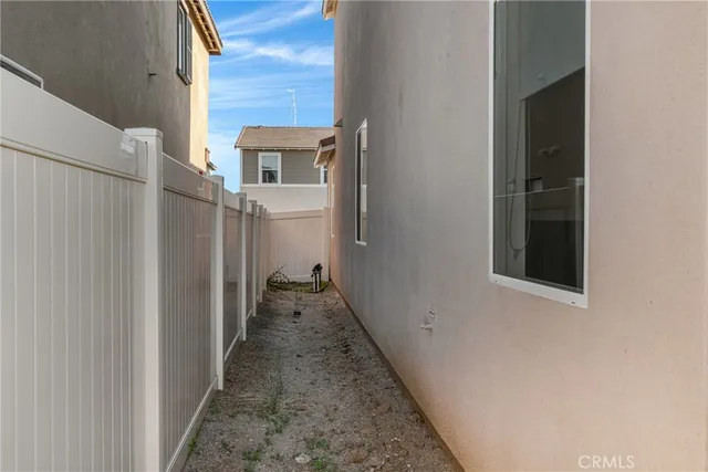 an aerial view of a house with a ocean view