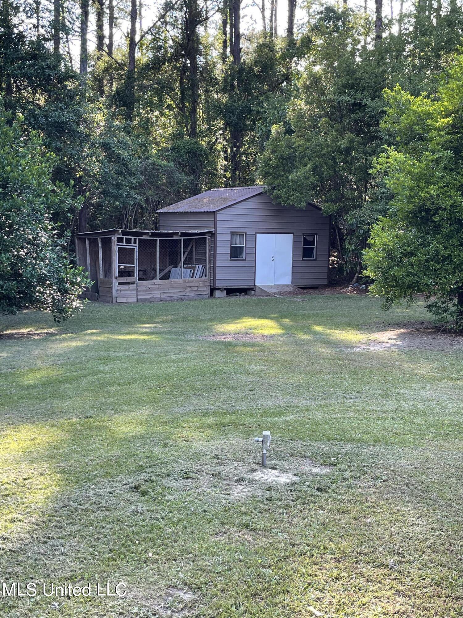 77 Covered Bridge Road Carriere, MS 39426 - Photo 5 of 19 shed with coop