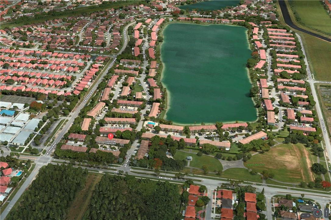 14085 Southwest 179th Terrace Miami, FL 33177 - Photo 1 of 6 a city view with tall buildings