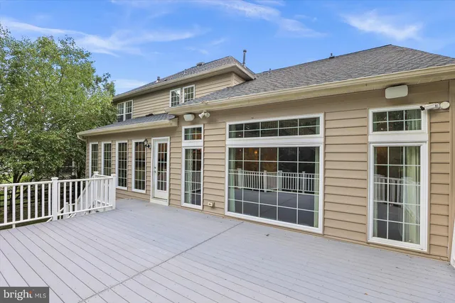 a view of a house with large windows