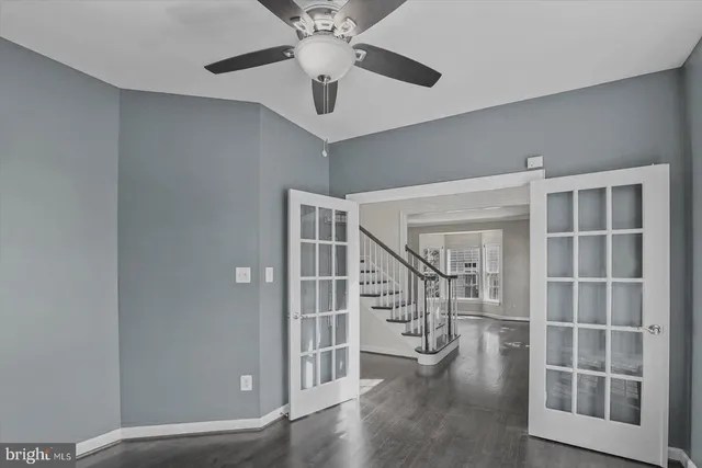 a view of entryway with stairs and wooden floor
