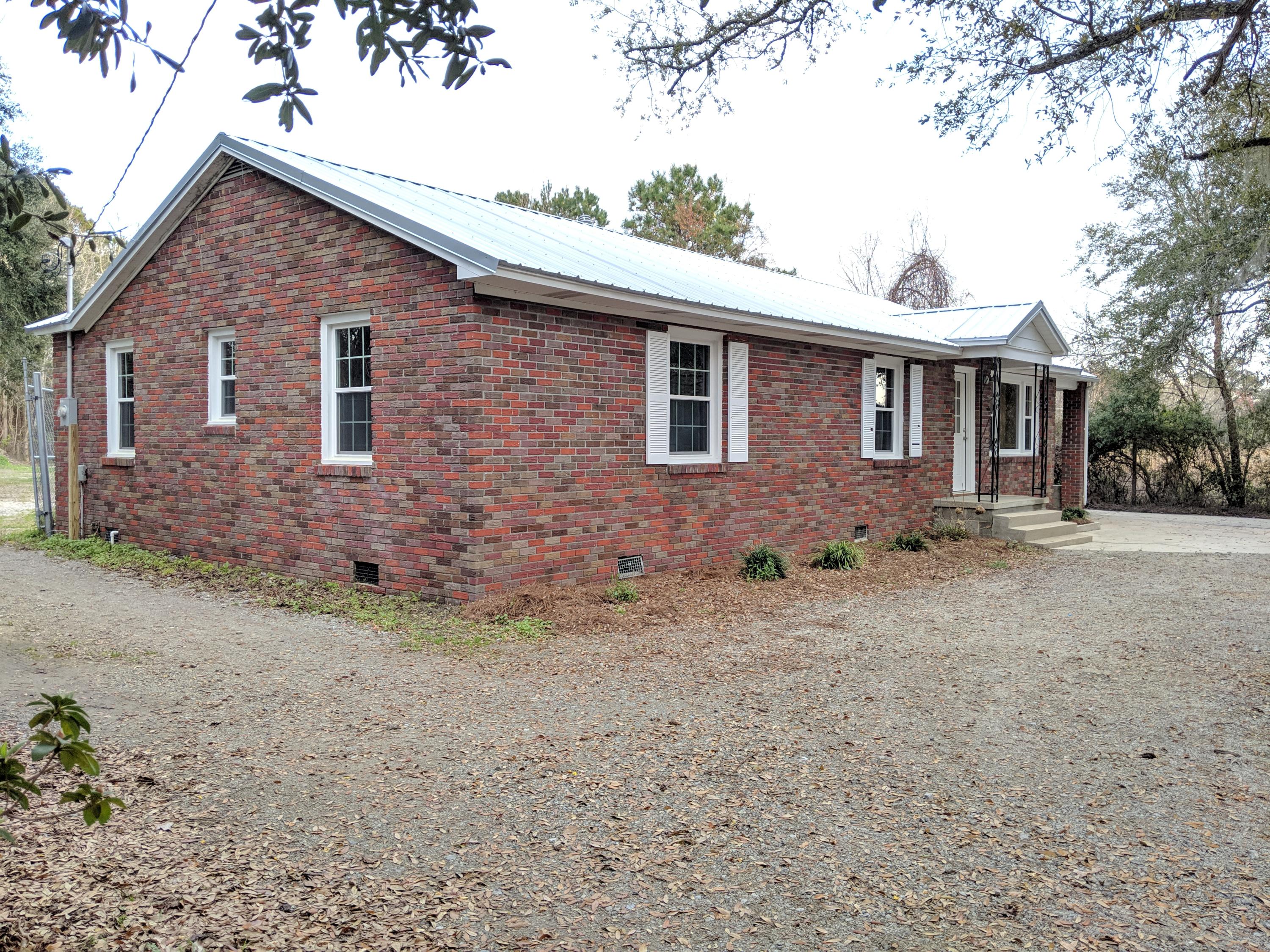 1064 Clements Ferry Road Wando, SC 29492 - Photo 7 of 15 1064 left side
