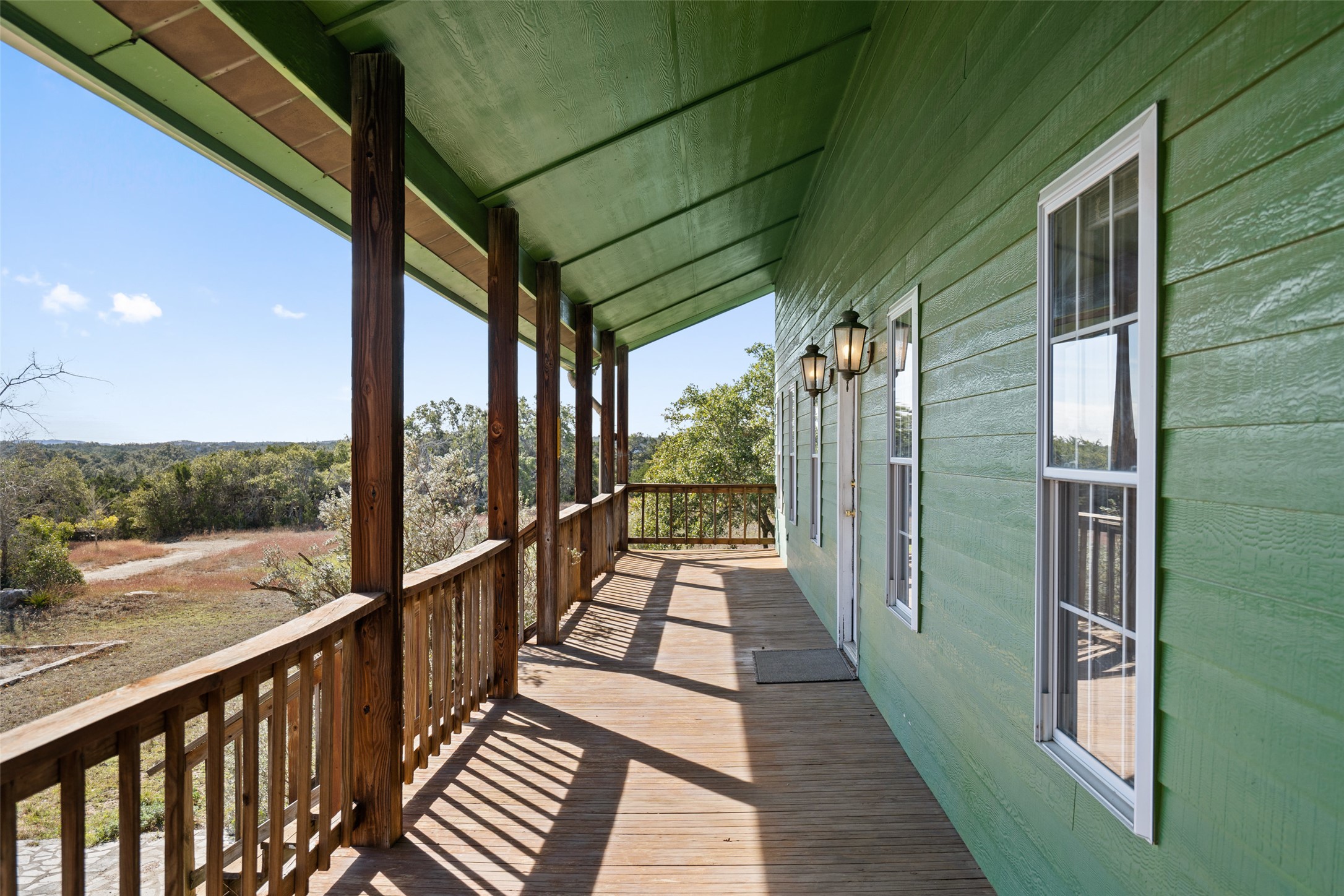1401 Pursley Road Dripping Springs, TX 78620 - Photo 5 of 35 View of wooden porch