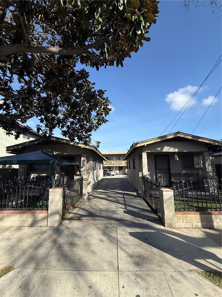 a view of a building with car parked