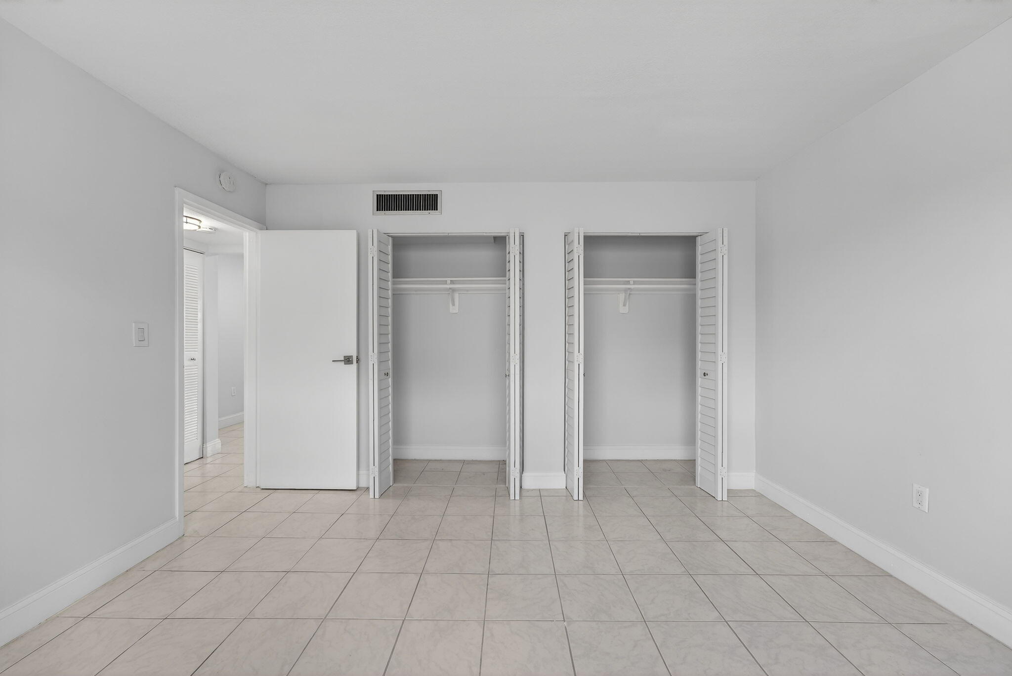 1335 West 68th Street, Unit 208 Hialeah, FL 33014 - Photo 11 of 20 a view of an empty room