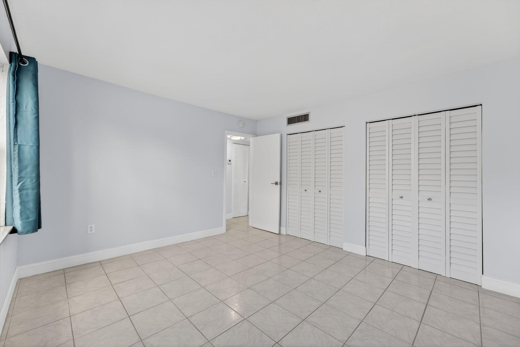 1335 West 68th Street, Unit 208 Hialeah, FL 33014 - Photo 12 of 20 a view of an empty room
