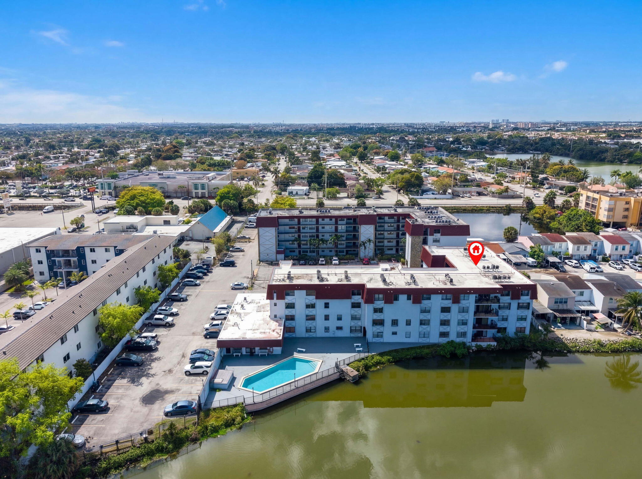 1335 West 68th Street, Unit 208 Hialeah, FL 33014 - Photo 18 of 20 a view of a city with tall buildings