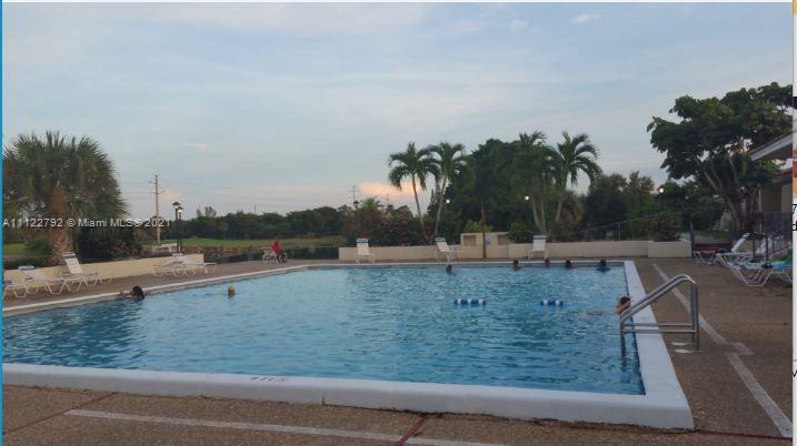 Manors of Inverrary Condominiums Lauderhill, FL 33319 - Photo 17 of 17 a view of a dry yard with a barn