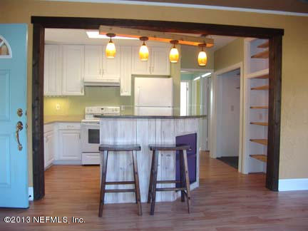 1911 Clemson Road Jacksonville, FL 32217 - Photo 11 of 26 a kitchen with a table and chairs in it