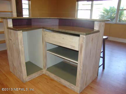 1911 Clemson Road Jacksonville, FL 32217 - Photo 12 of 26 a kitchen with windows and a sink